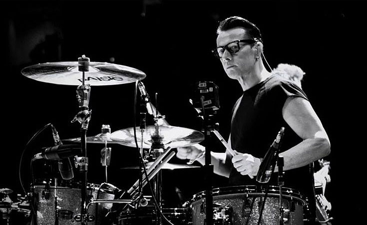 Playing the Larry Mullen Jr role for U2.V2